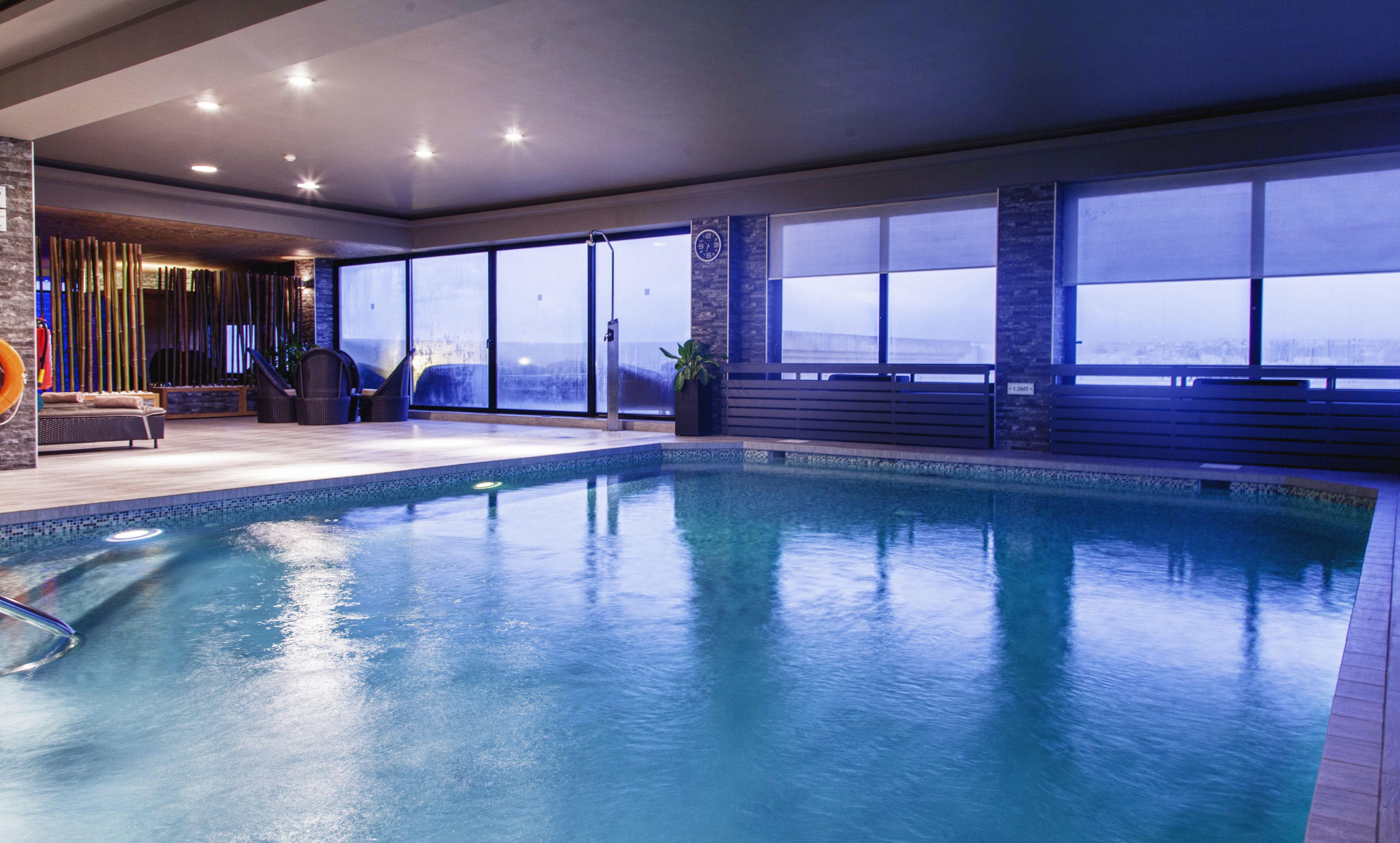 indoor pool, outdoor pool, pool loungers