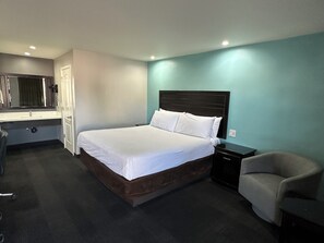 Deluxe Room, 1 King Bed, Non Smoking | 1 bedroom, in-room safe, individually decorated, individually furnished