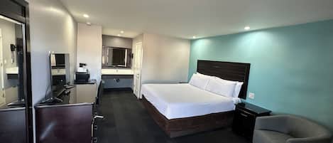 Deluxe Room, 1 King Bed, Non Smoking | In-room safe, individually decorated, individually furnished, desk