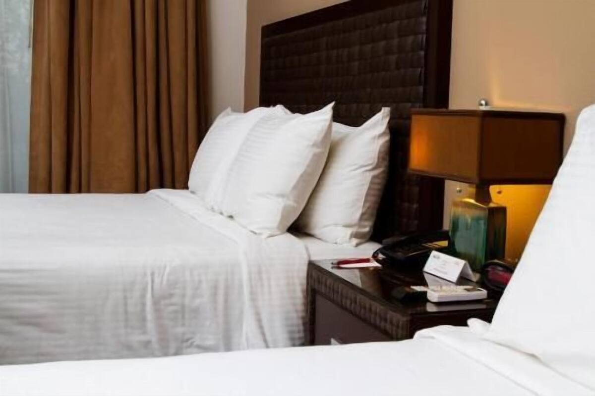 Hypo-allergenic bedding, down comforters, in-room safe, desk