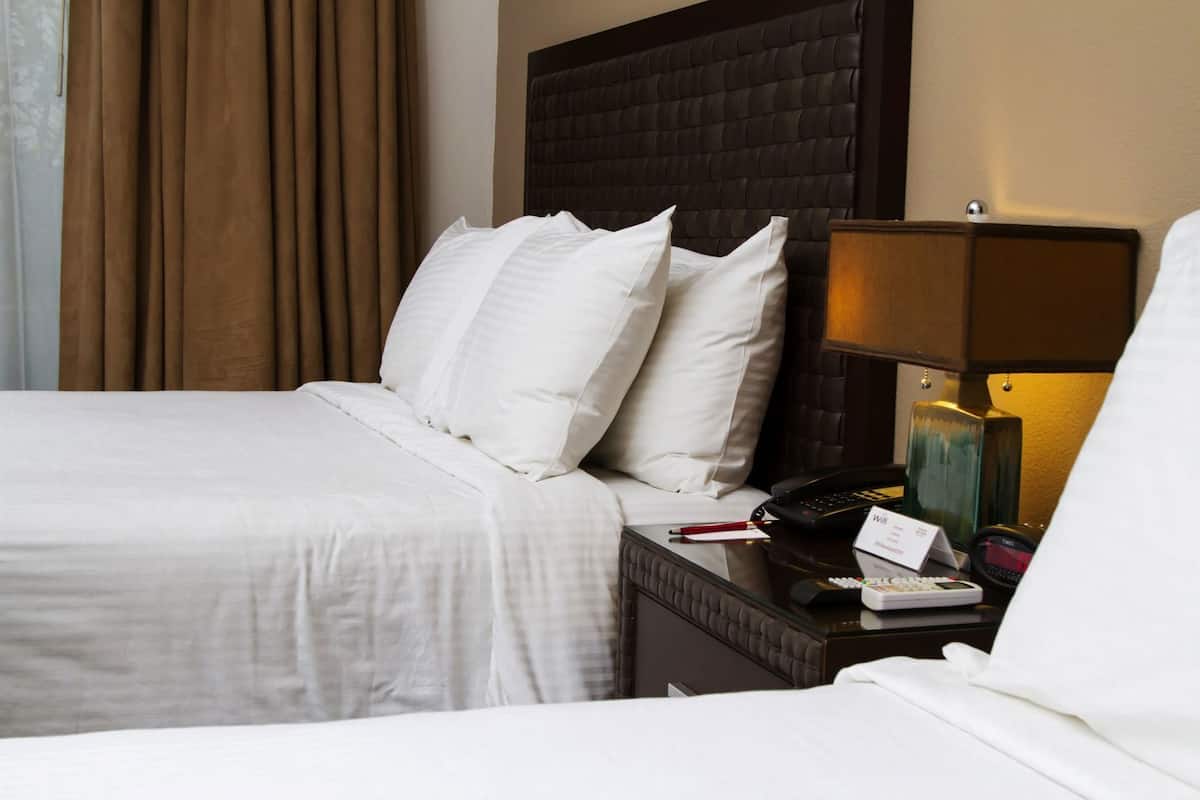 Hypo-allergenic bedding, down comforters, in-room safe, desk