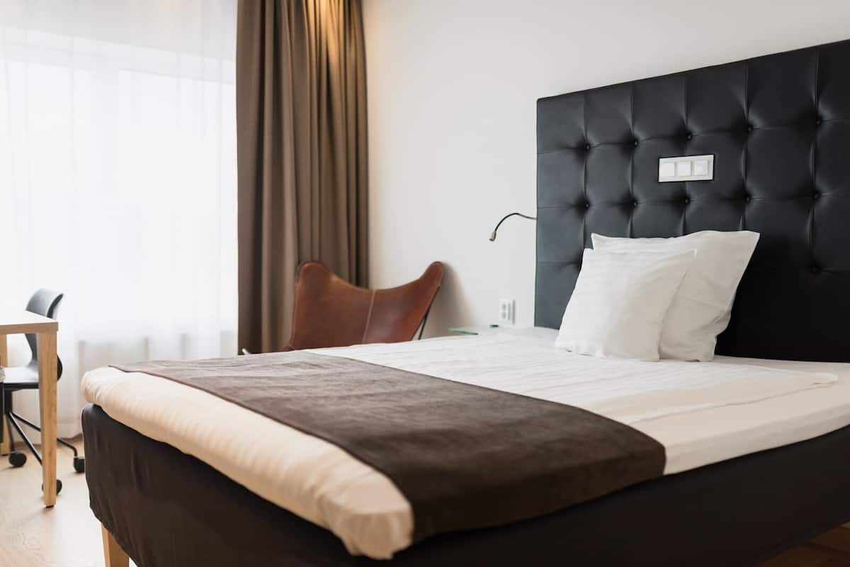 Desk, laptop workspace, free WiFi, bed sheets