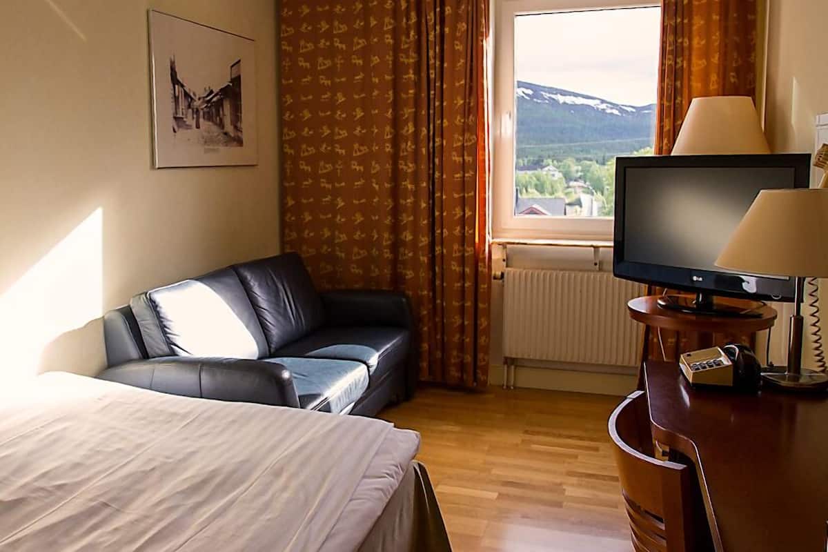 Desk, laptop workspace, free WiFi, bed sheets