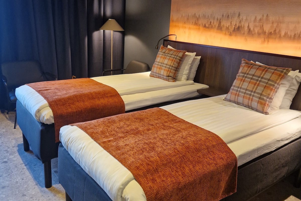 Desk, laptop workspace, free WiFi, bed sheets