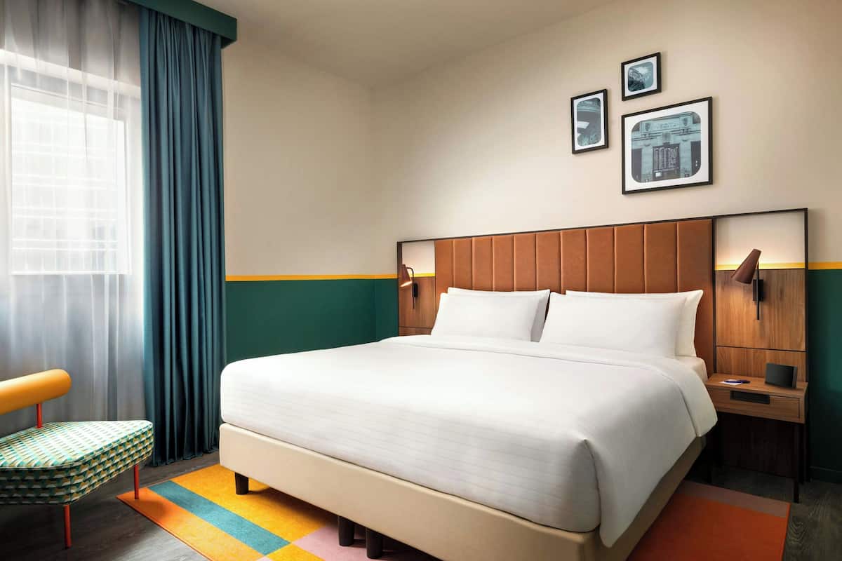 Suite, 1 King Bed with Sofa bed (Studio) | 1 bedroom, down duvets, minibar, in-room safe