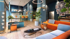 A modern hotel lobby with a central seating area, a bar, and a reception desk. - Duo Milan Porta Nuova, A Tribute Portfolio Hotel (Milan)