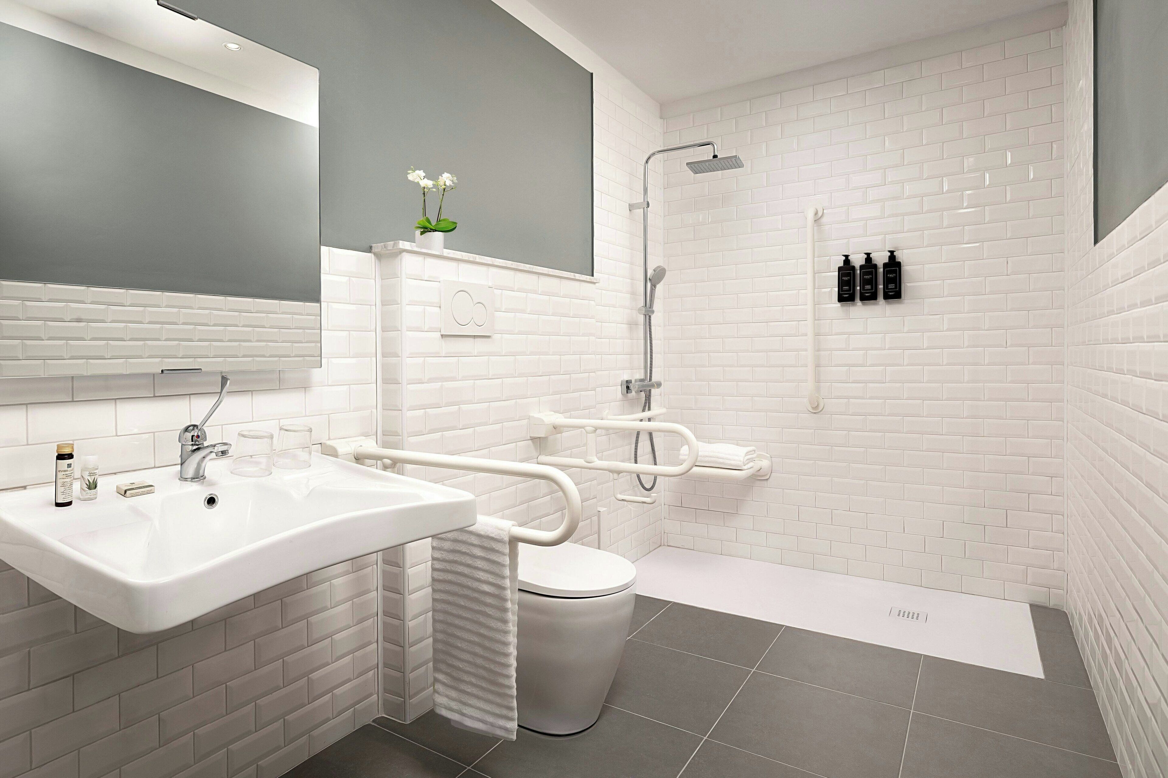 rainfall showerhead, hair dryer, bidet, towels