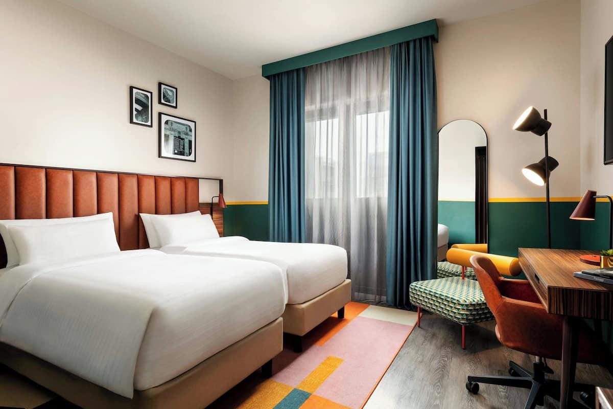 Twin Room (Porta Nuova) | 1 bedroom, down duvets, minibar, in-room safe