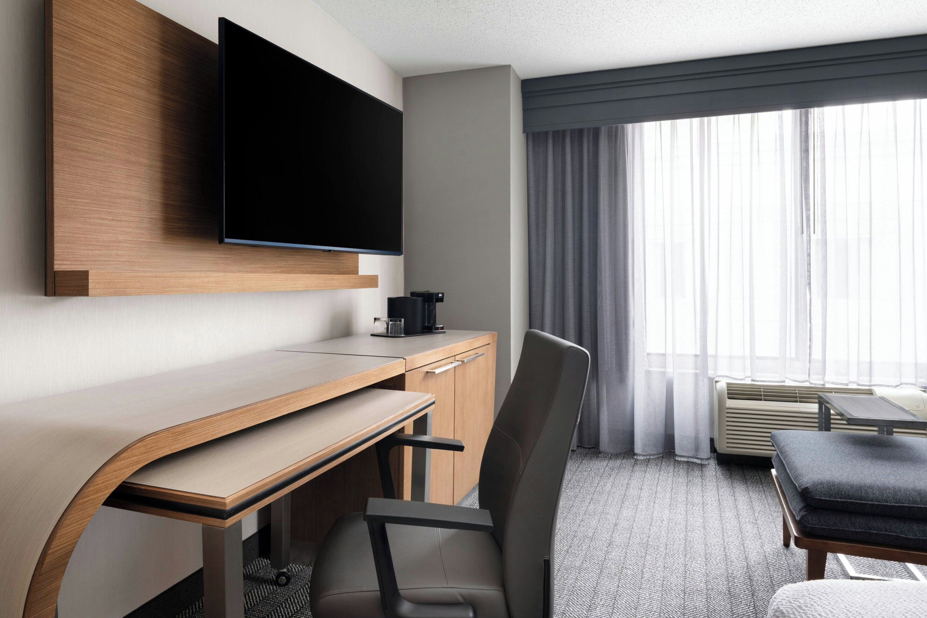 desk, blackout curtains, iron/ironing board, free cots/infant beds