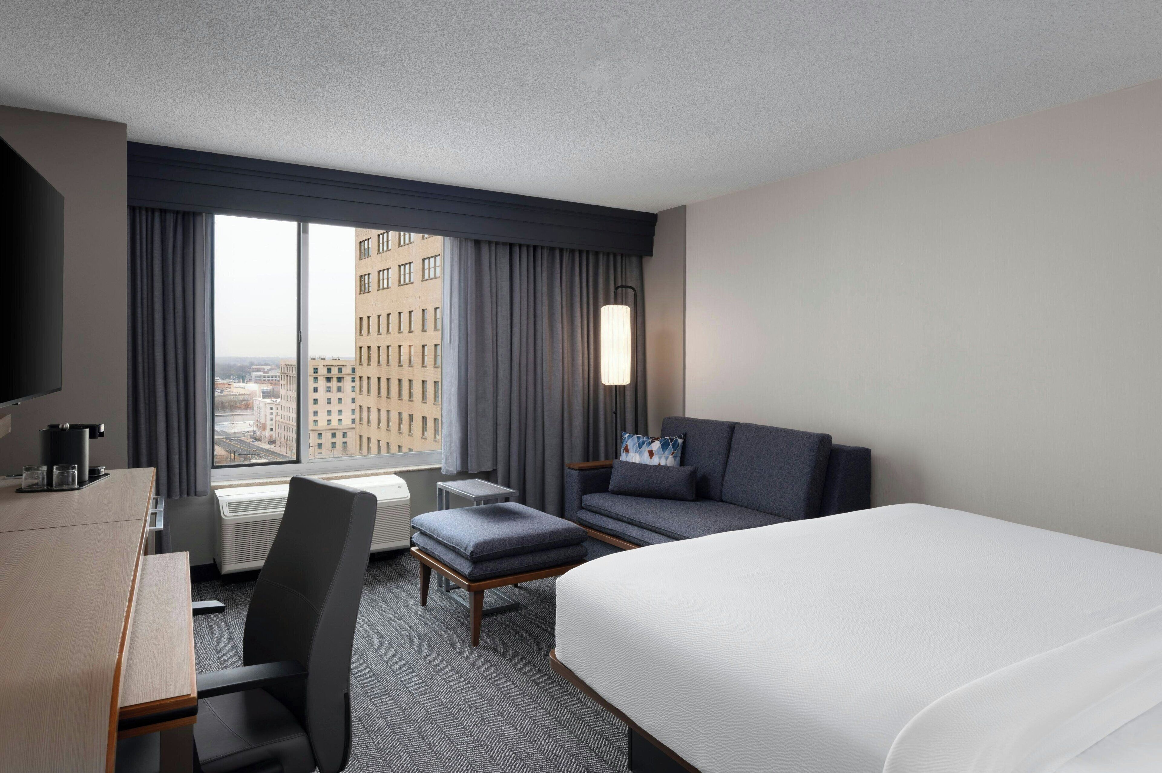 desk, blackout curtains, iron/ironing board, free cots/infant beds