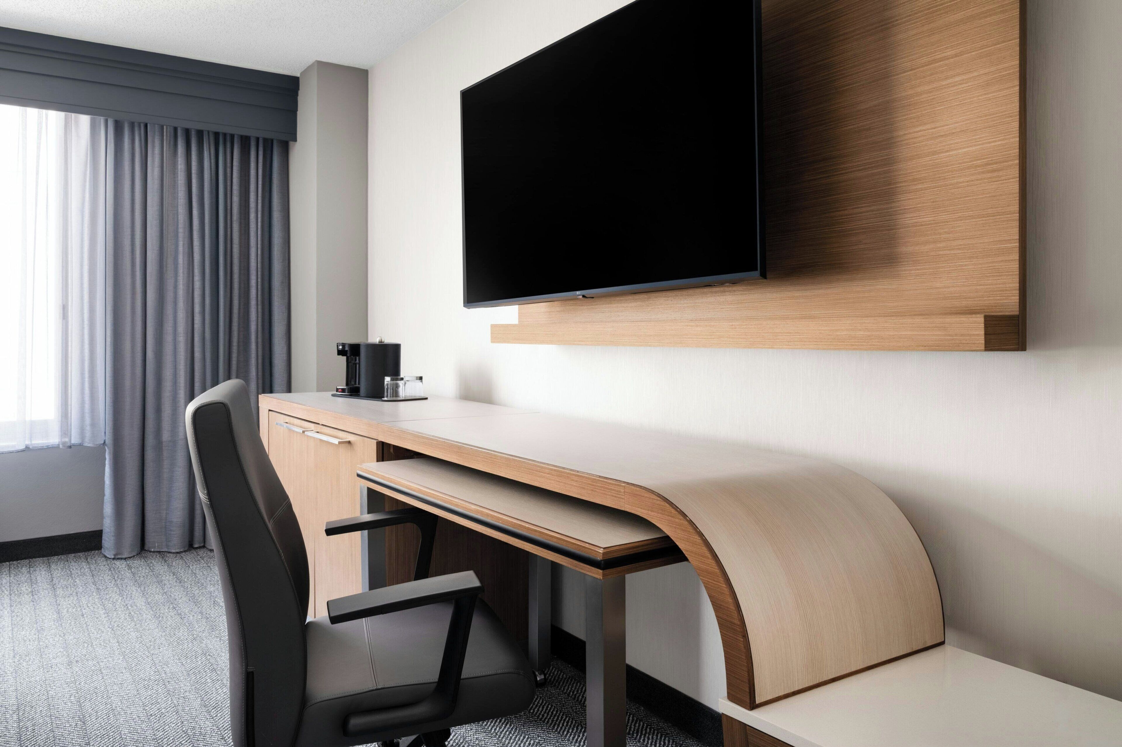 desk, blackout curtains, iron/ironing board, free cots/infant beds