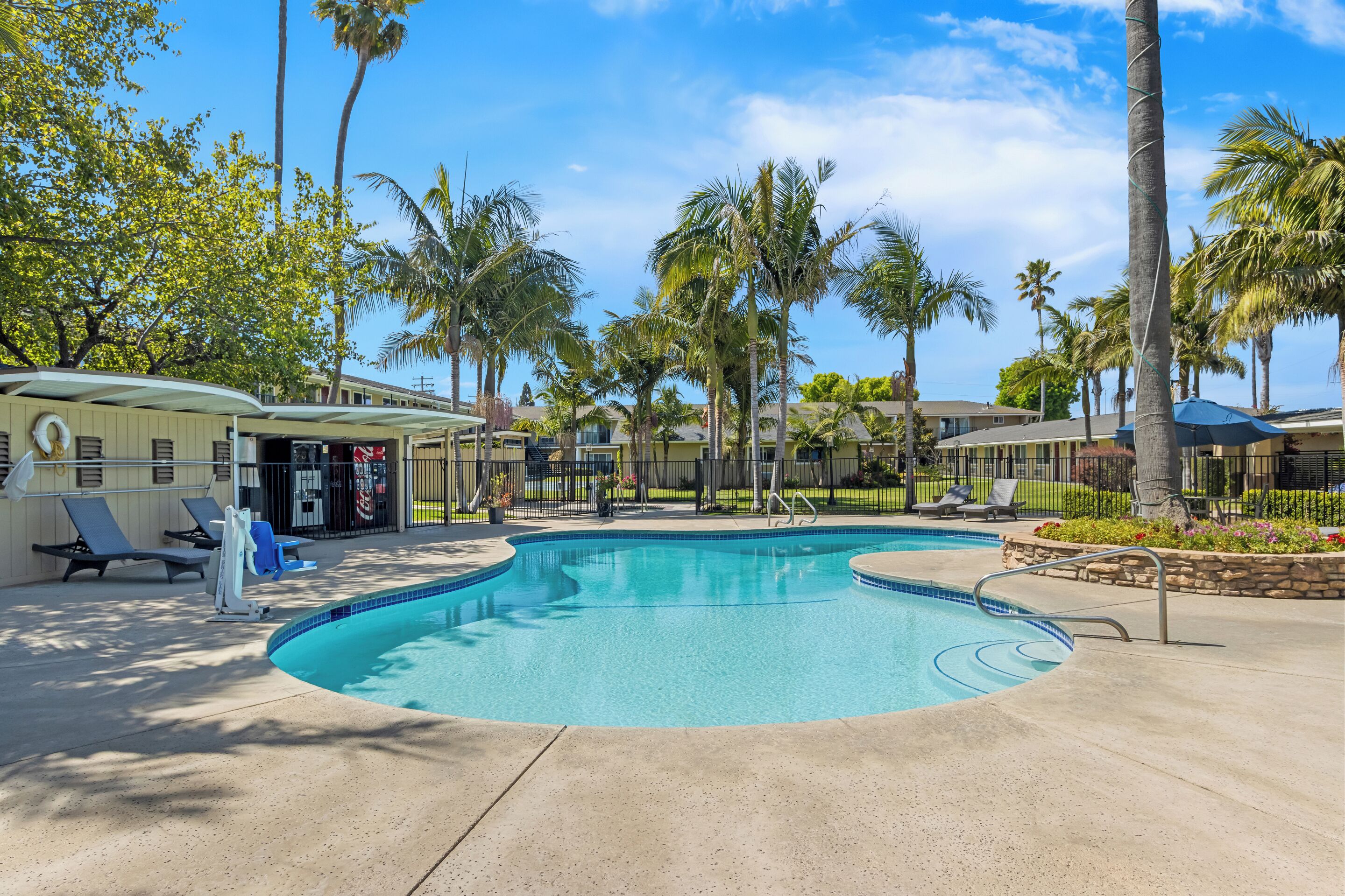 Outdoor pool, open 9:00 AM to 9 PM, pool umbrellas, sun loungers