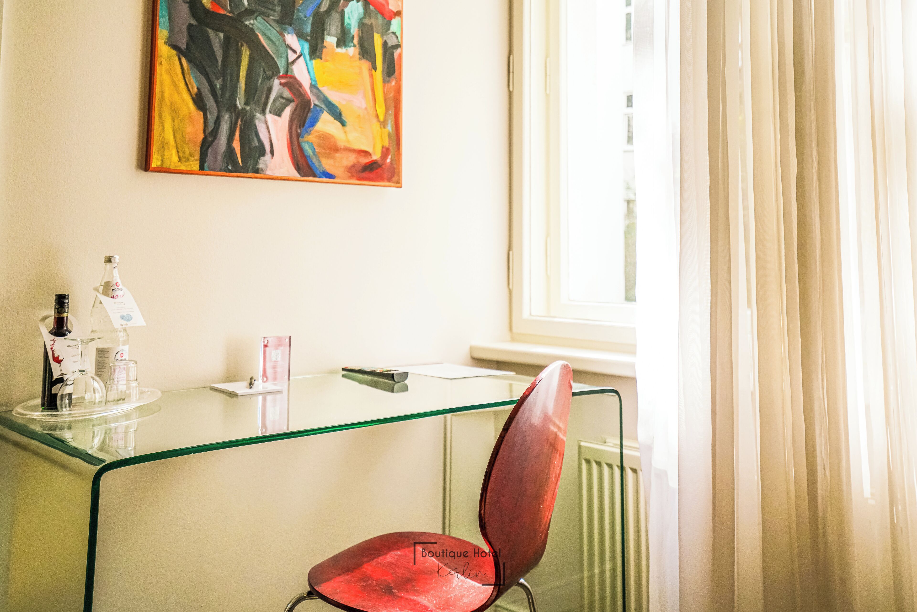 classic double room, 2 single beds, courtyard view | living area | 32-inch flat-screen tv with cable channels, books