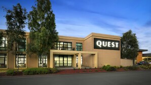 A modern building with a sign that reads "QUEST" on the facade. - Quest Narre Warren (Narre Warren)