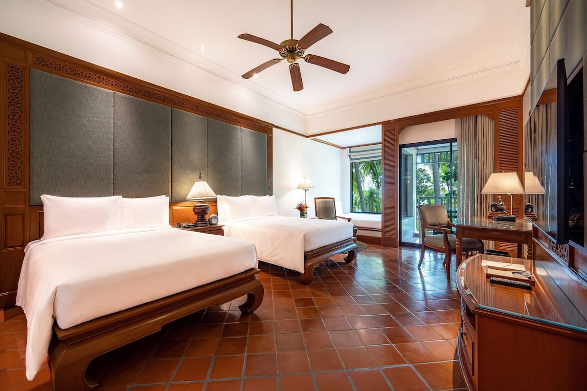 family room, 2 double beds, non smoking, garden view (balcony) | 1 bedroom, premium bedding, minibar, in-room safe