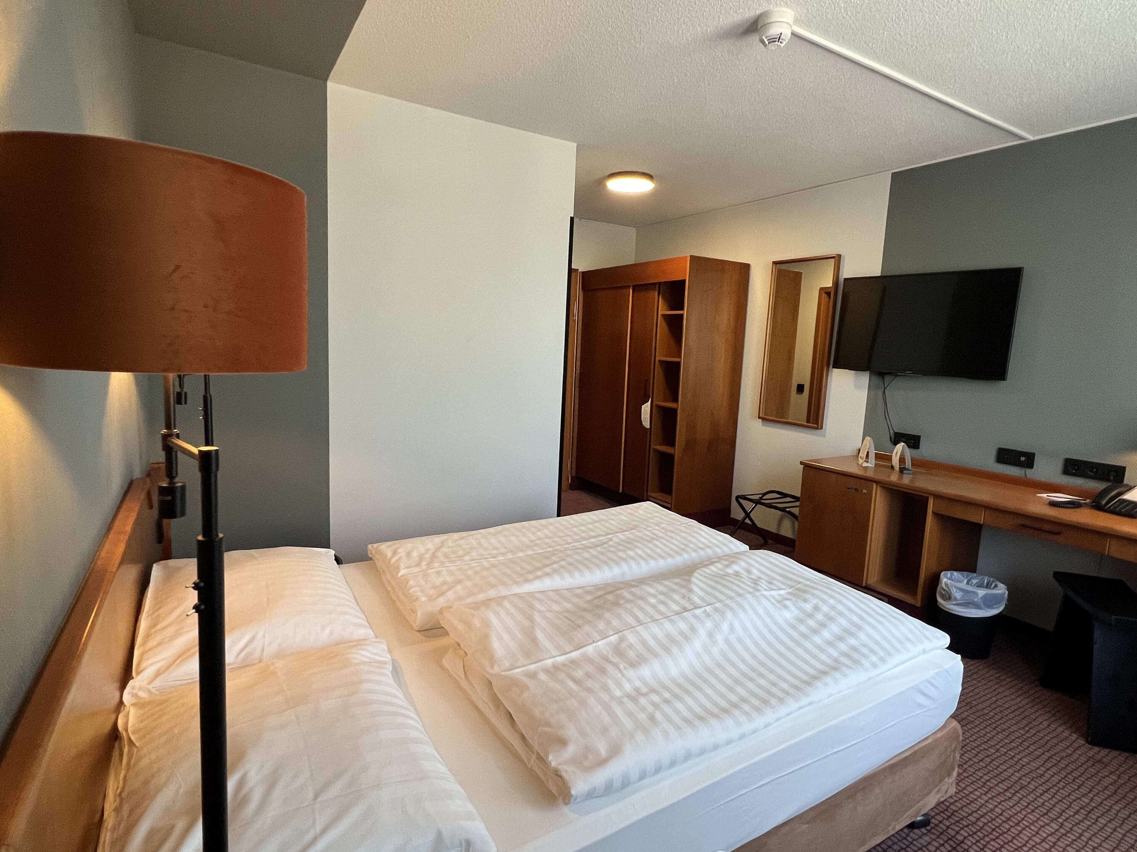 standard double room | hypo-allergenic bedding, down duvets, in-room safe, desk