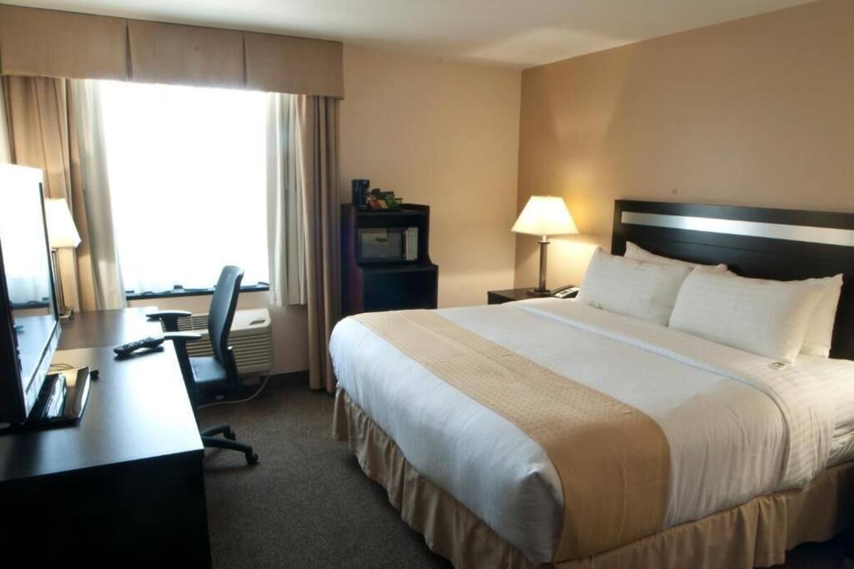 In-room safe, desk, laptop workspace, blackout curtains