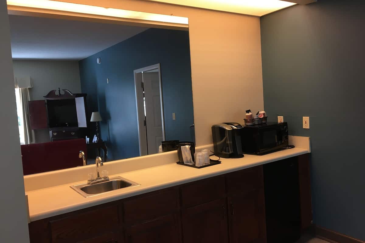 suite, 1 king bed, non smoking (two room) | living area | flat-screen tv