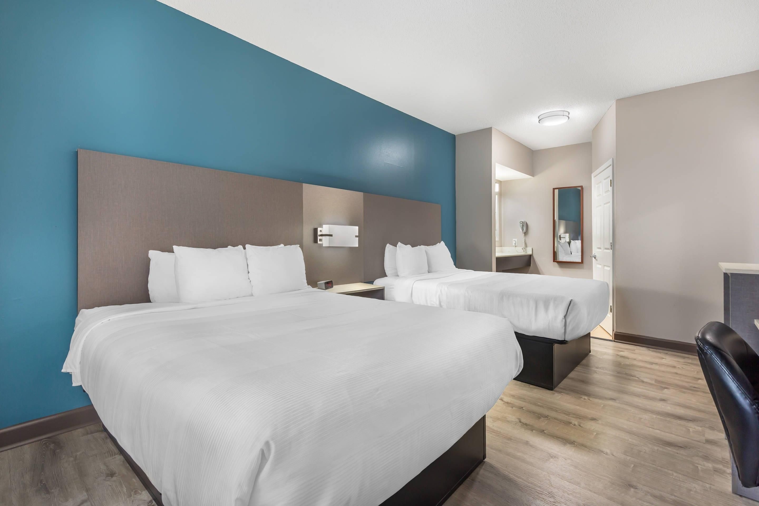 Iron/ironing board, cribs (free), WiFi (free), bed sheets