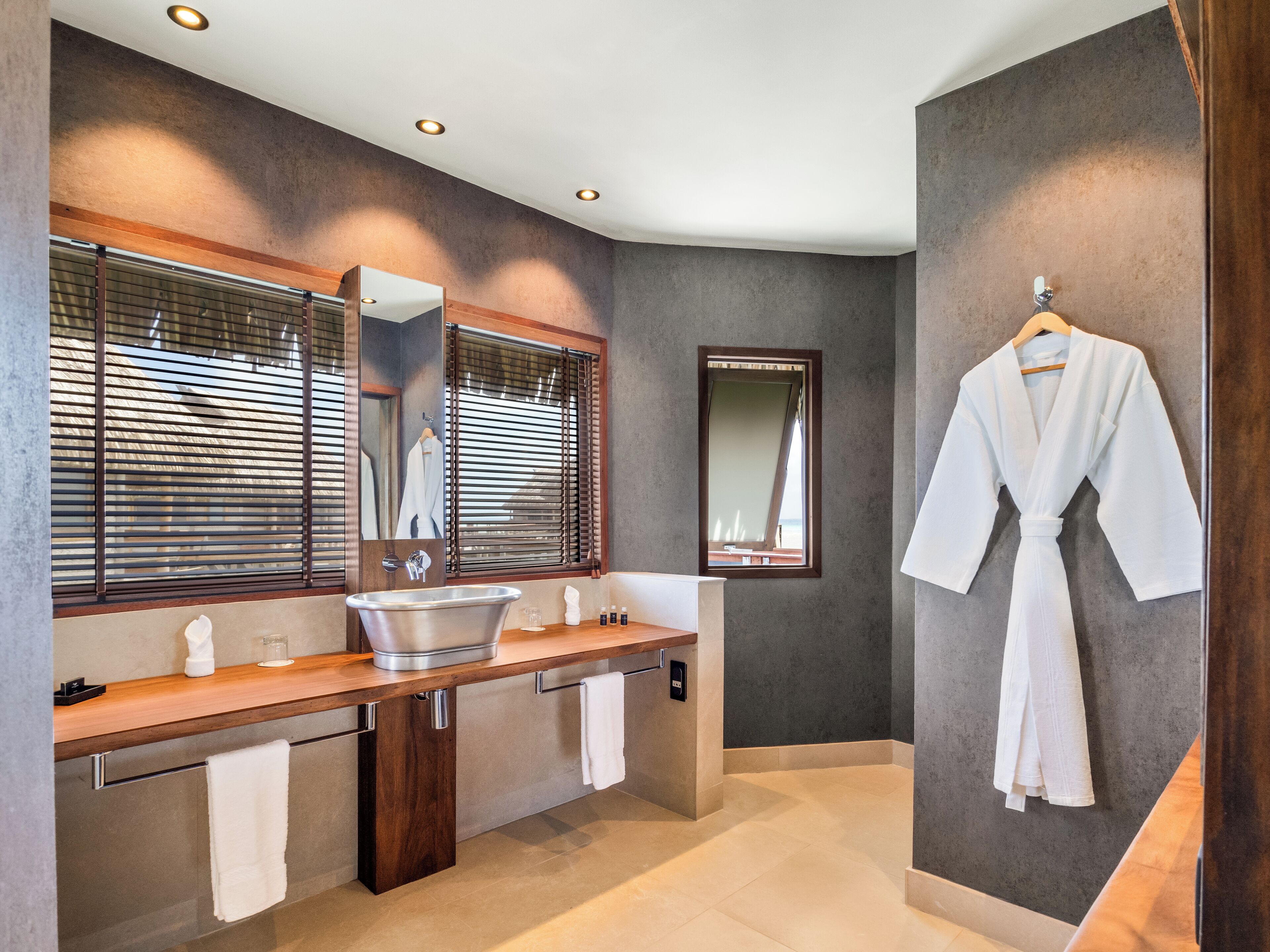 eco-friendly toiletries, hair dryer, bathrobes, slippers