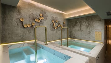 Sauna, tina de hidromasaje, tratamientos corporales y aromaterapia