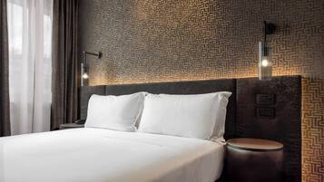Hypo-allergenic bedding, memory-foam beds, minibar, in-room safe