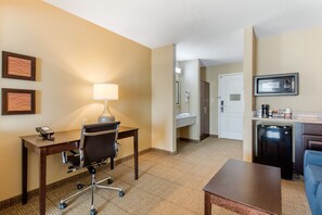 Premium bedding, desk, laptop workspace, blackout curtains