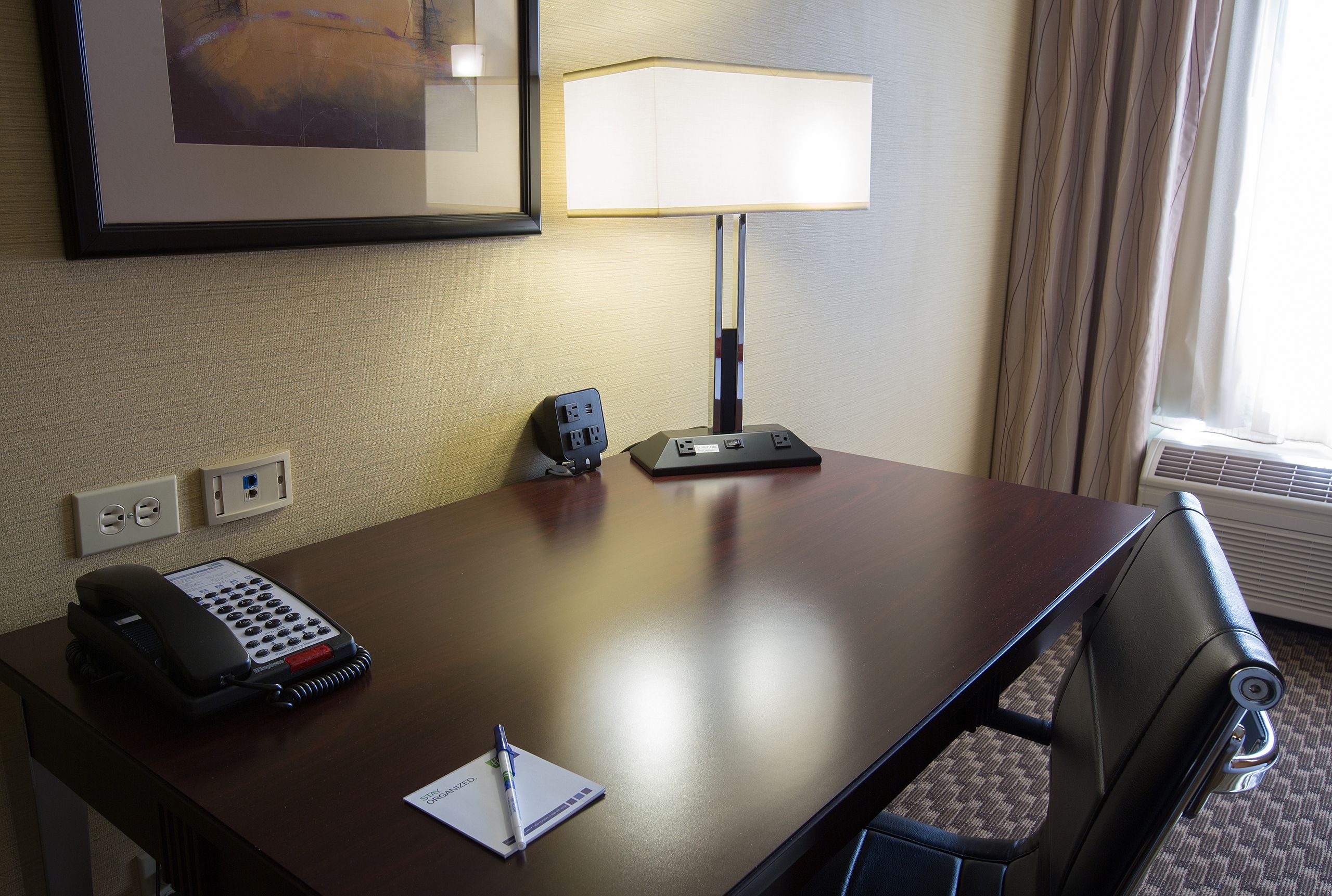 premium bedding, pillow-top beds, desk, blackout curtains