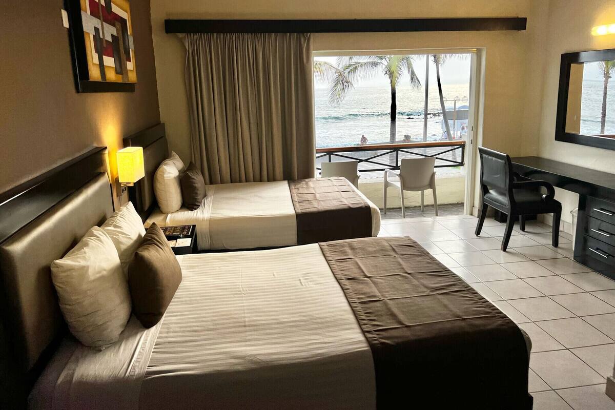 Blackout drapes, iron/ironing board, WiFi (free), bed sheets