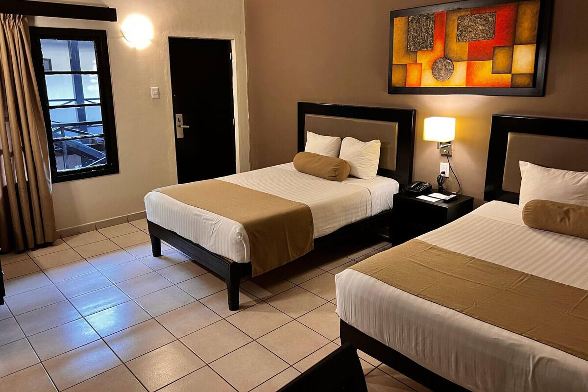 Blackout drapes, iron/ironing board, WiFi (free), bed sheets