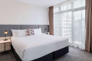 Hypo-allergenic bedding, in-room safe, desk, blackout drapes