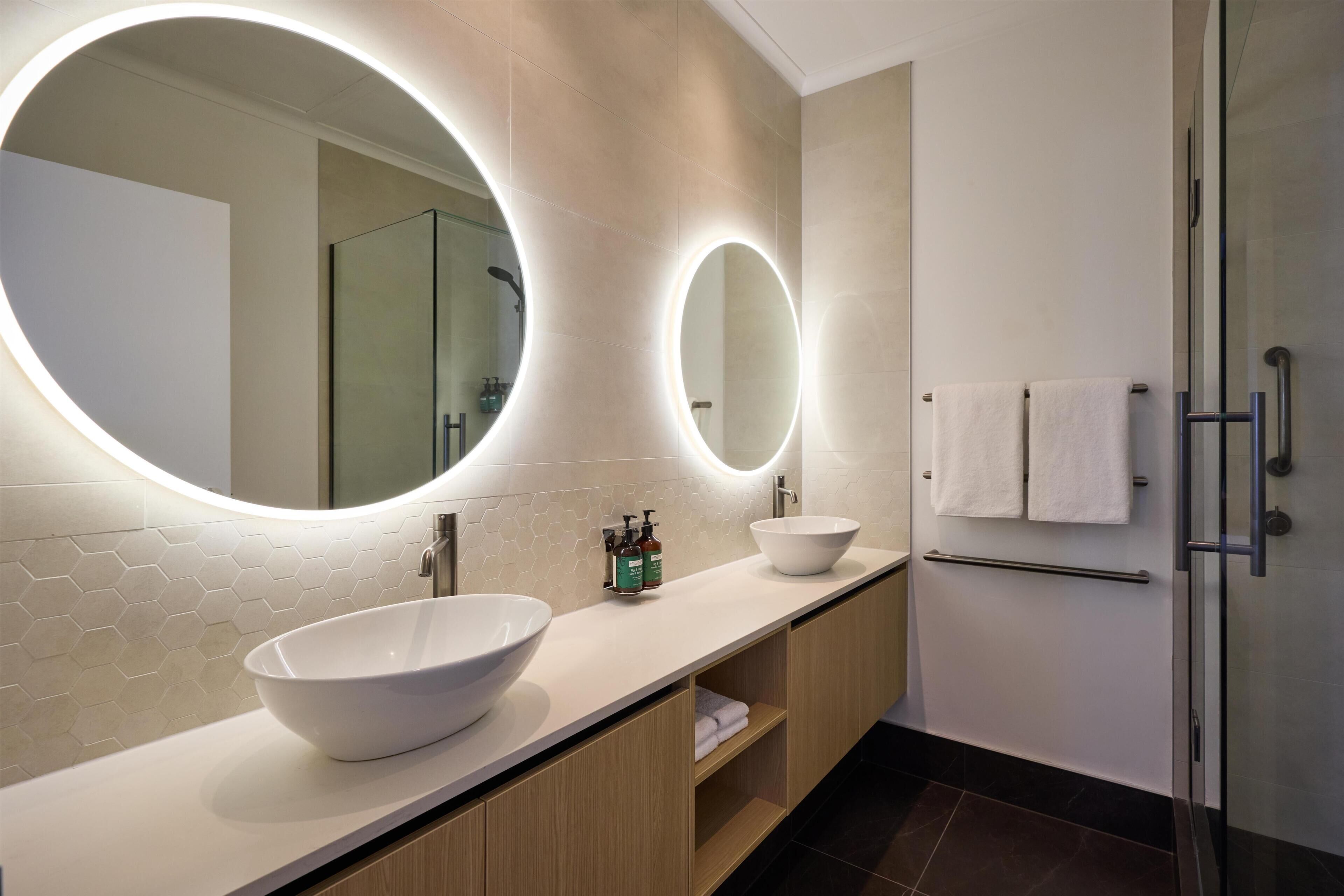 Separate bathtub and shower, free toiletries, hair dryer, bathrobes