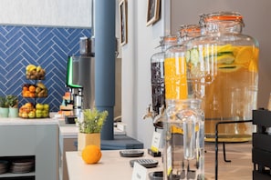 Enjoy a refreshing drink at our bar, where a variety of beverages and fresh fruits are always available.