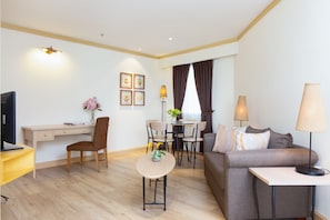 Superior Studio | Living area | 40-inch LED TV with cable channels, TV, DVD player - Riverfront Bangkok (Bangkok)