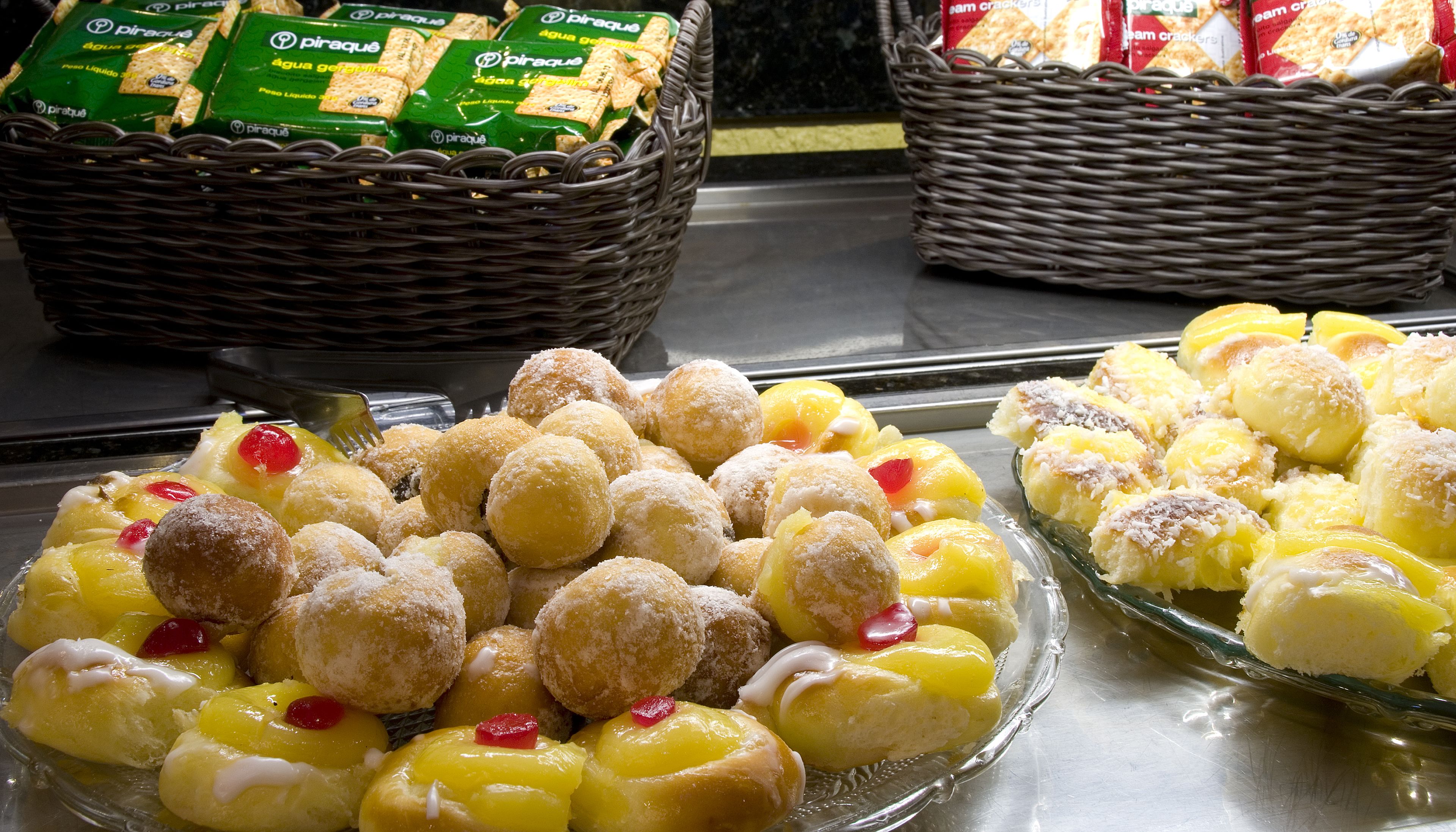 A display of snacks including chips and pastries.