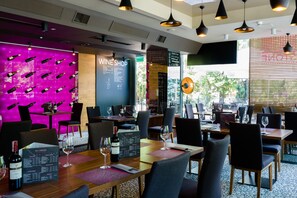 Breakfast, lunch, dinner served; al fresco dining 