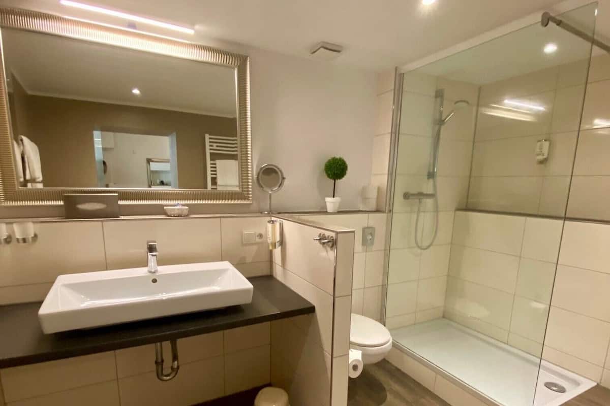 family apartment | bathroom | shower, free toiletries, hair dryer, towels