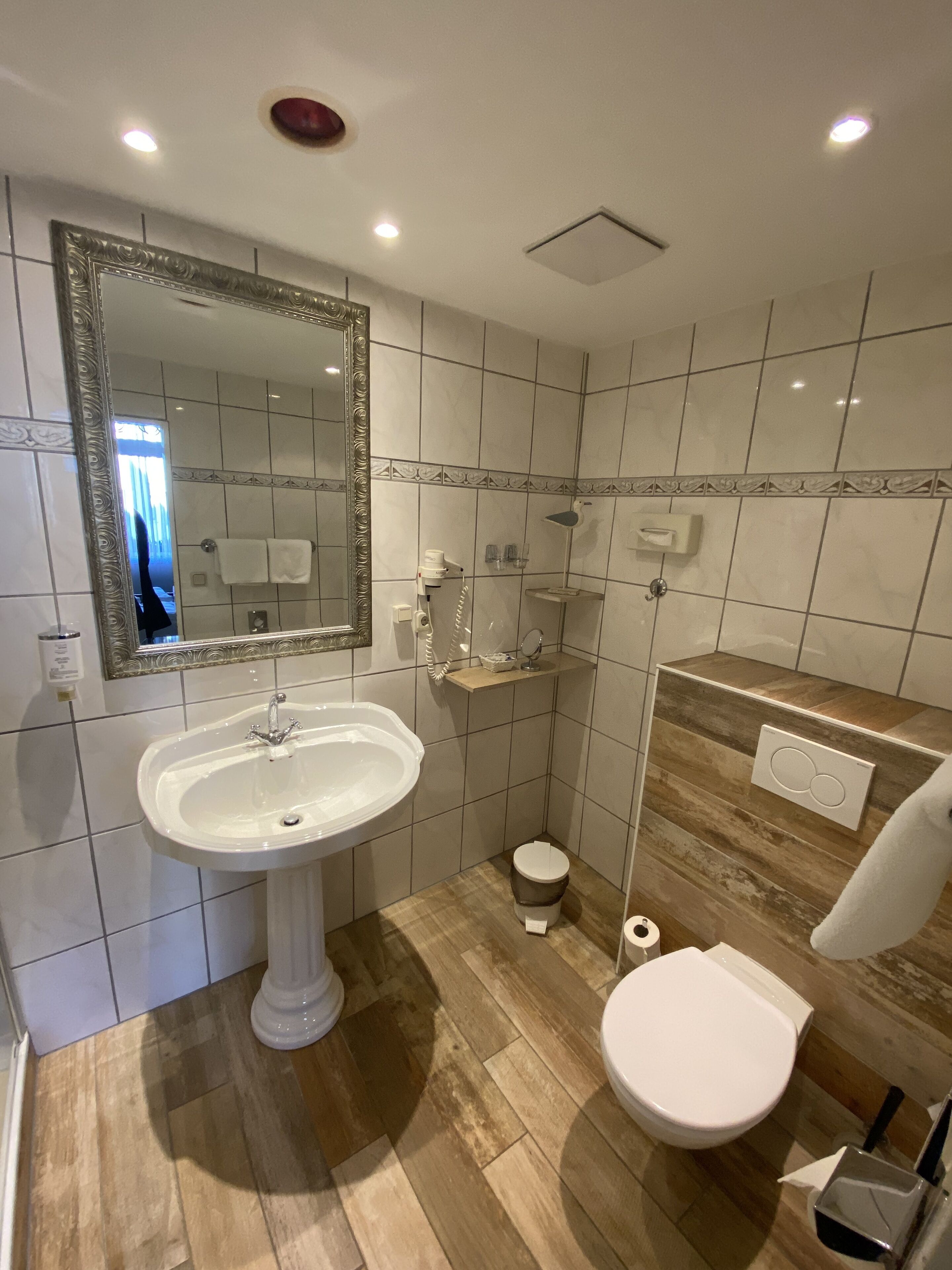 superior double room | bathroom | shower, free toiletries, hair dryer, towels
