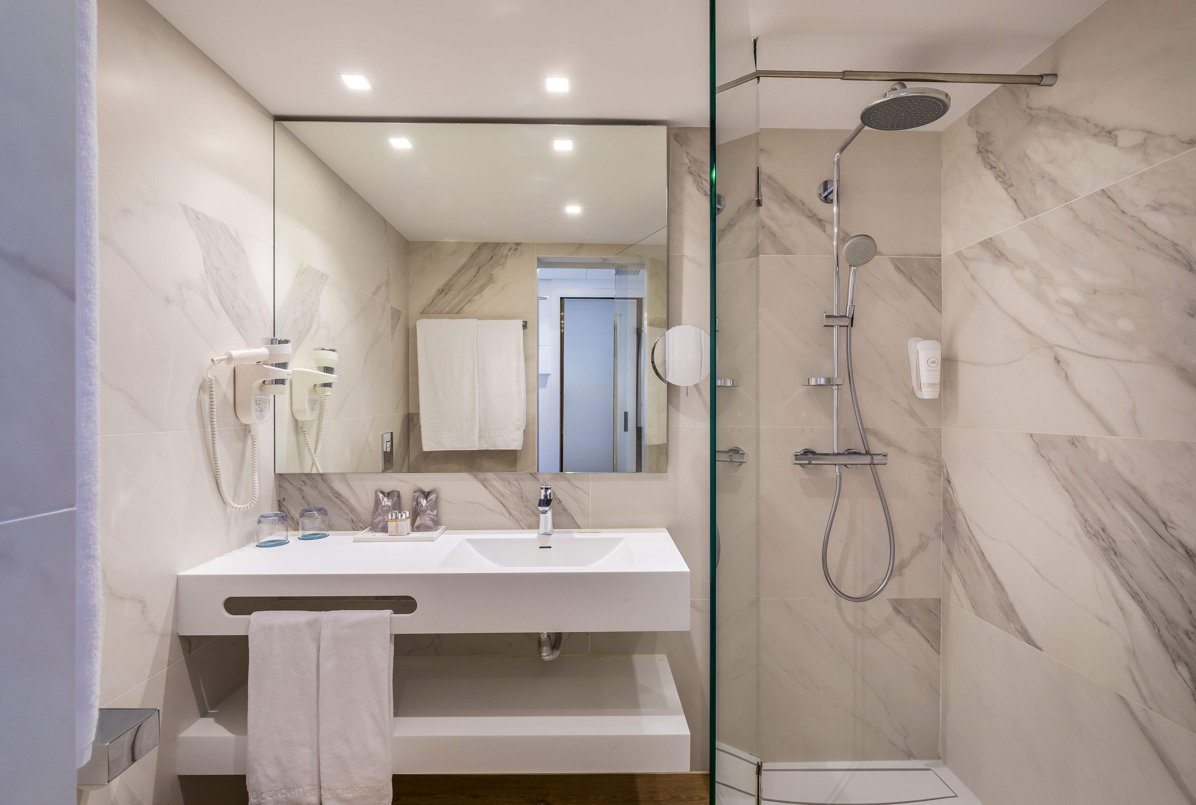 free toiletries, hair dryer, towels, soap