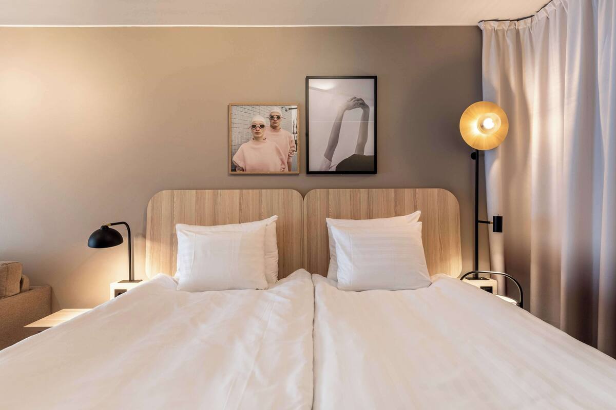 Desk, blackout curtains, free cots/infant beds, free WiFi