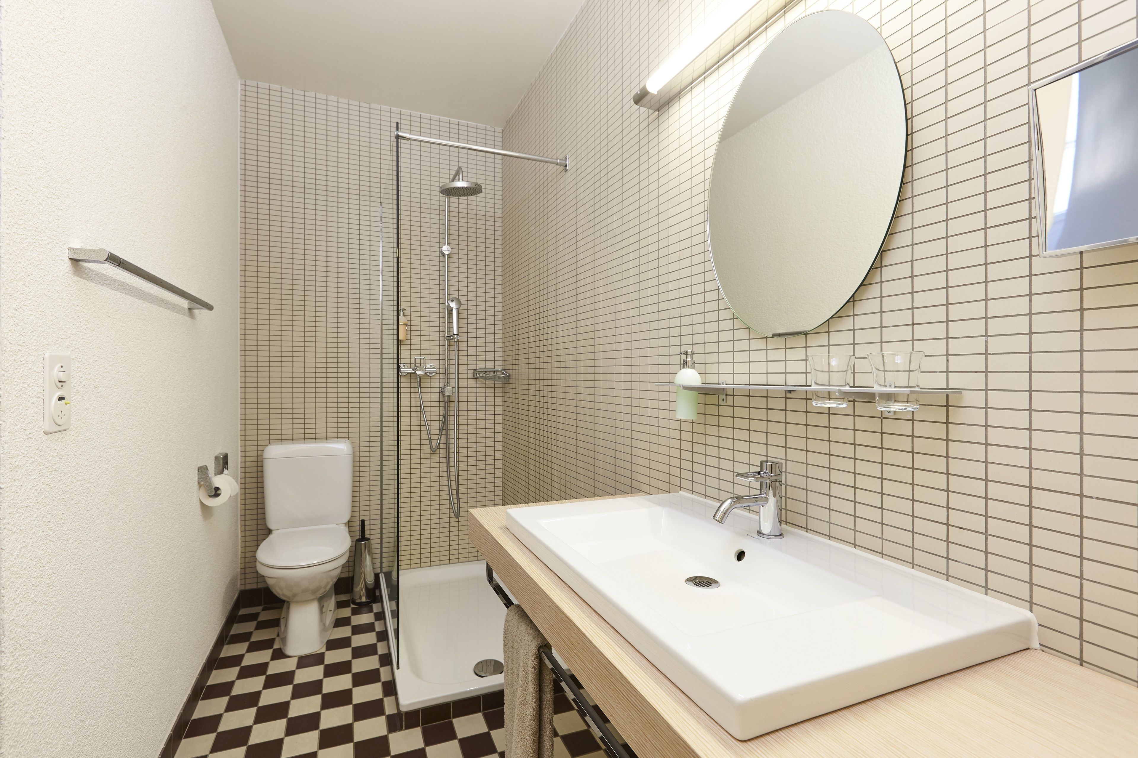 charming mini suite | bathroom | hair dryer, bathrobes, towels, shampoo