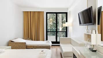 Standard Triple Room (Spa Building) | Desk, laptop workspace, blackout curtains, free WiFi