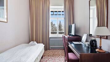Desk, laptop workspace, blackout curtains, free WiFi