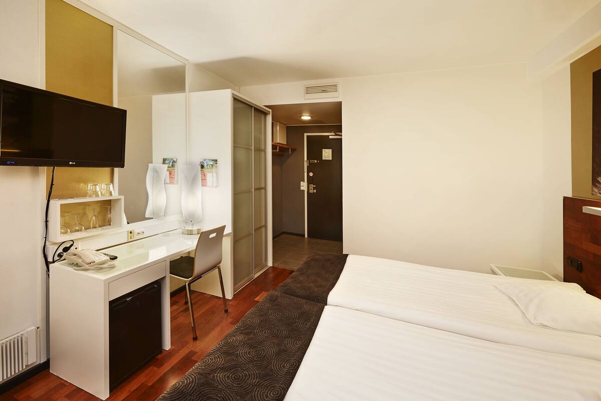 desk, blackout curtains, free wifi, bed sheets