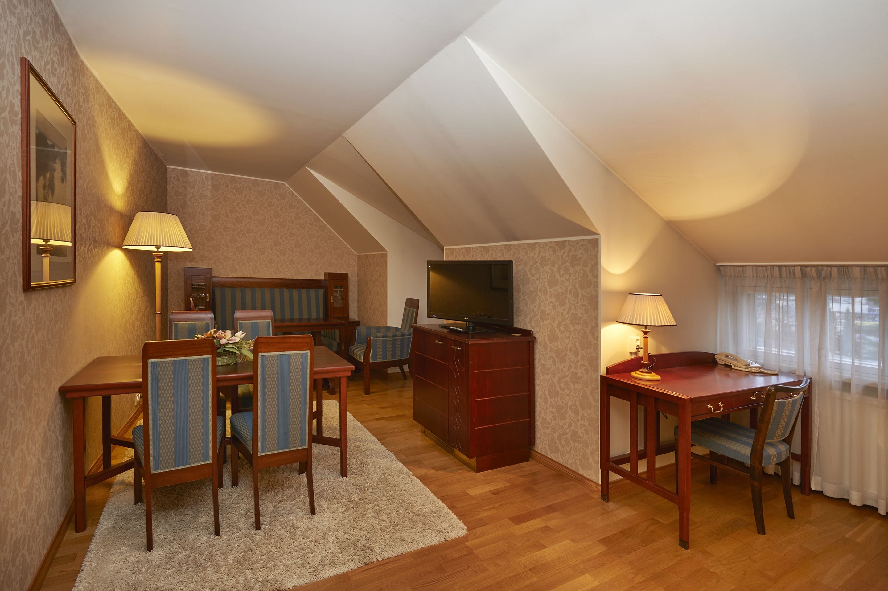 superior twin room (large, linna building) | living area | tv, pay films