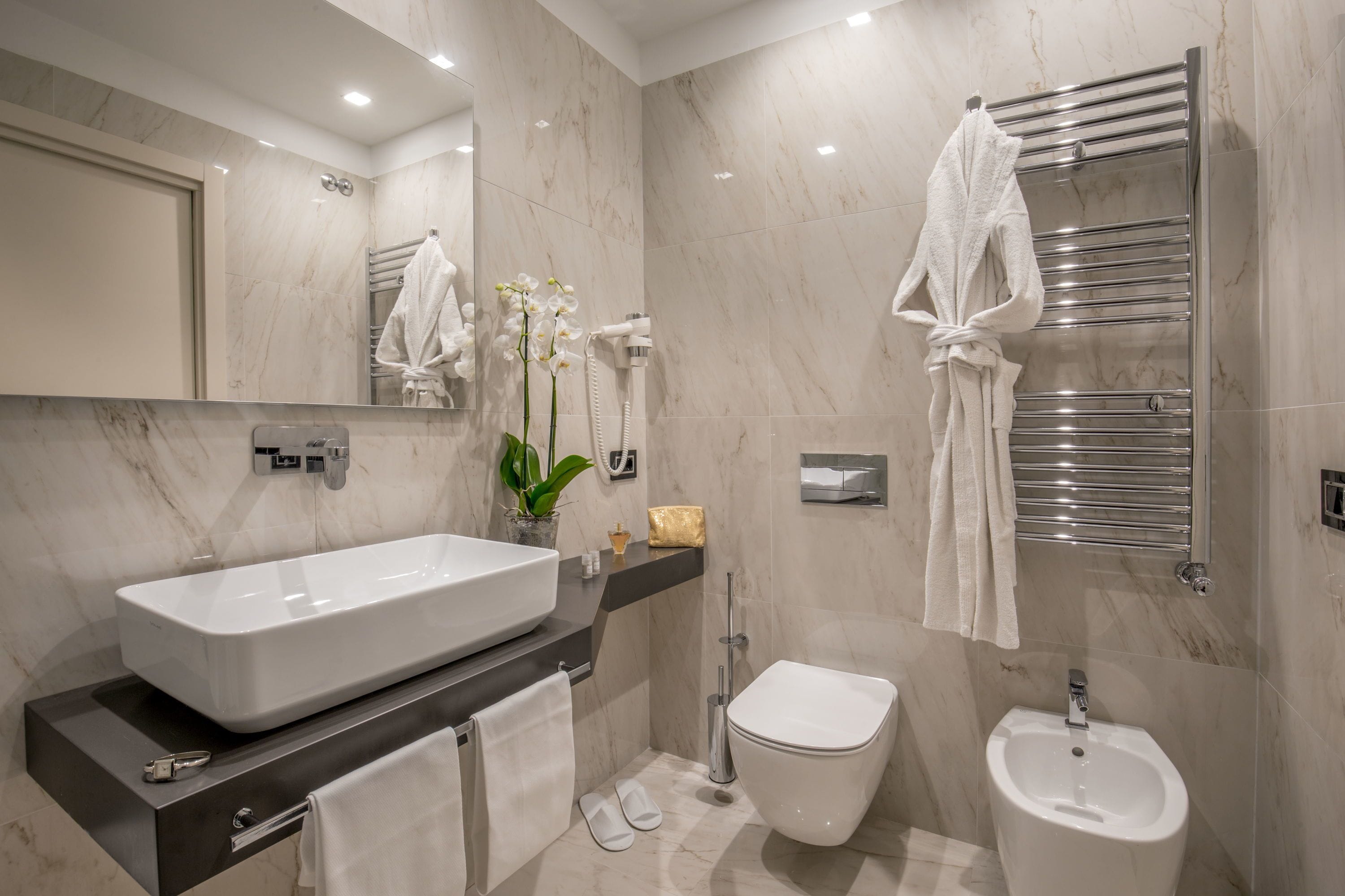 deluxe double or twin room | bathroom | free toiletries, hair dryer, bidet, towels