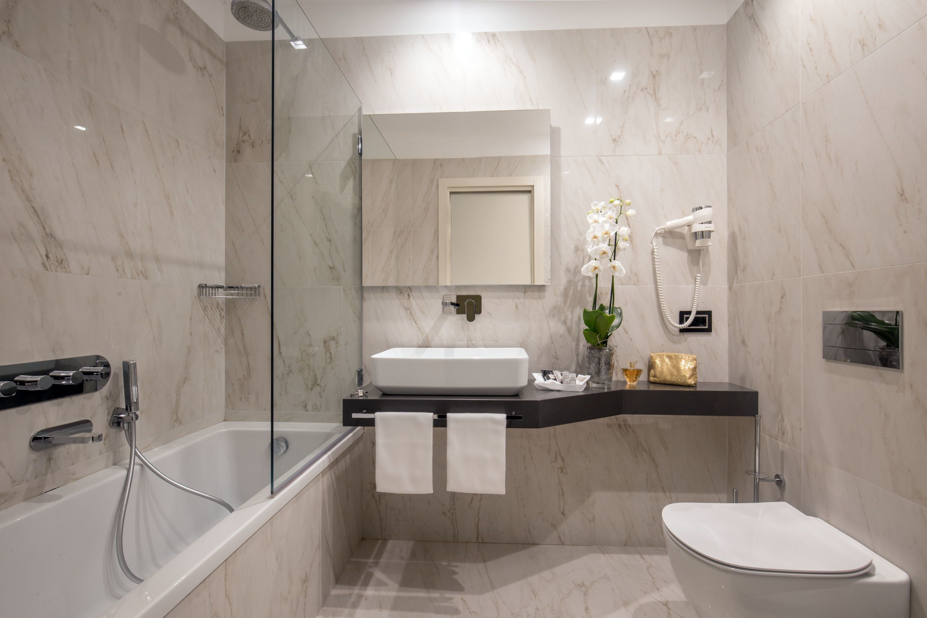 free toiletries, hair dryer, bidet, towels