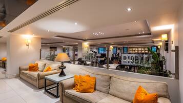 3 bars/lounges, 2 poolside bars, beach bar