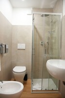 Double or Twin Room | Bathroom | Shower, rainfall showerhead, hair dryer, bidet