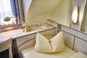 Triple Room | Hypo-allergenic bedding, minibar, desk, blackout drapes